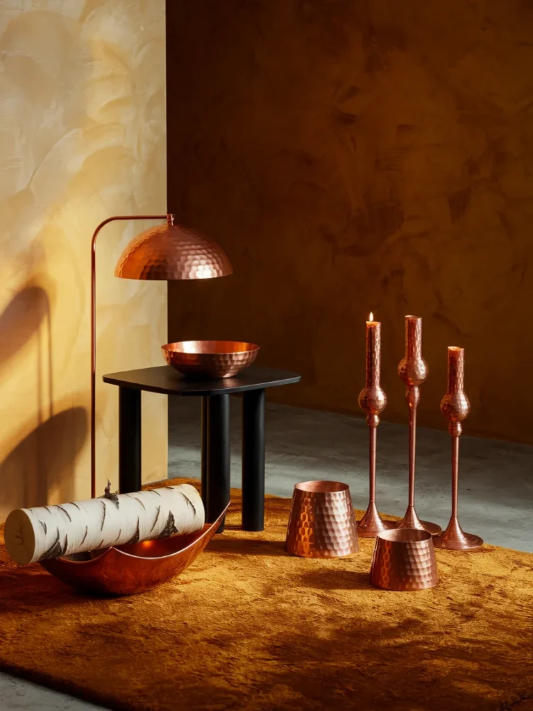 Six ways to use copper living room decor including lamp, bowl, candle holders, and log holder