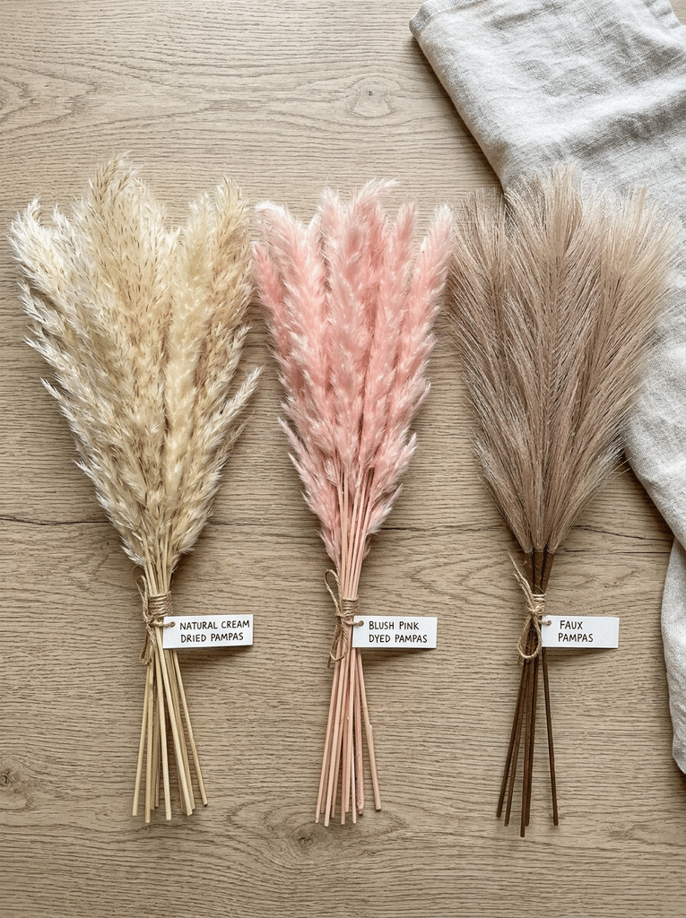 Comparison of natural dried, blush pink dyed, and faux pampas grass stems for bedroom decor